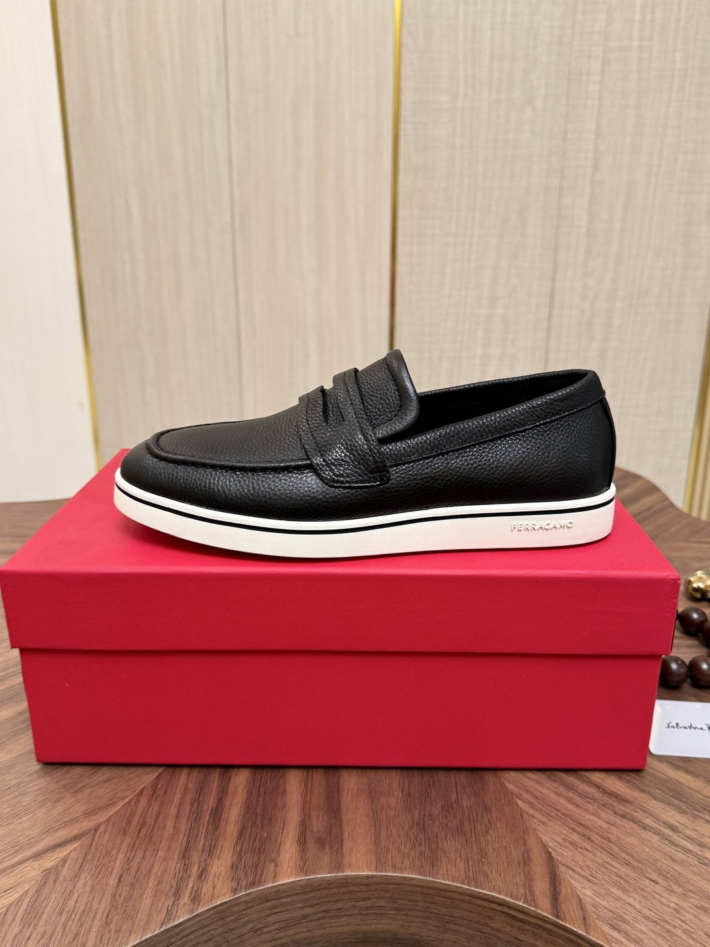 Salvatore Ferragamo Black Loafers with White Soles